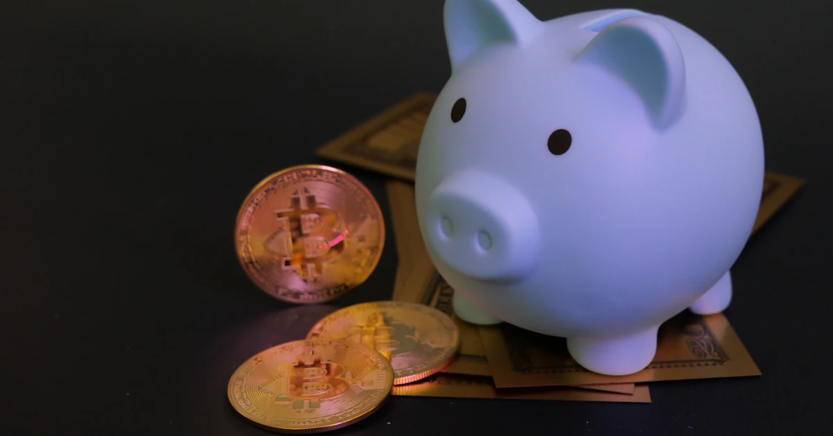 Piggy bank with bitcoin coins